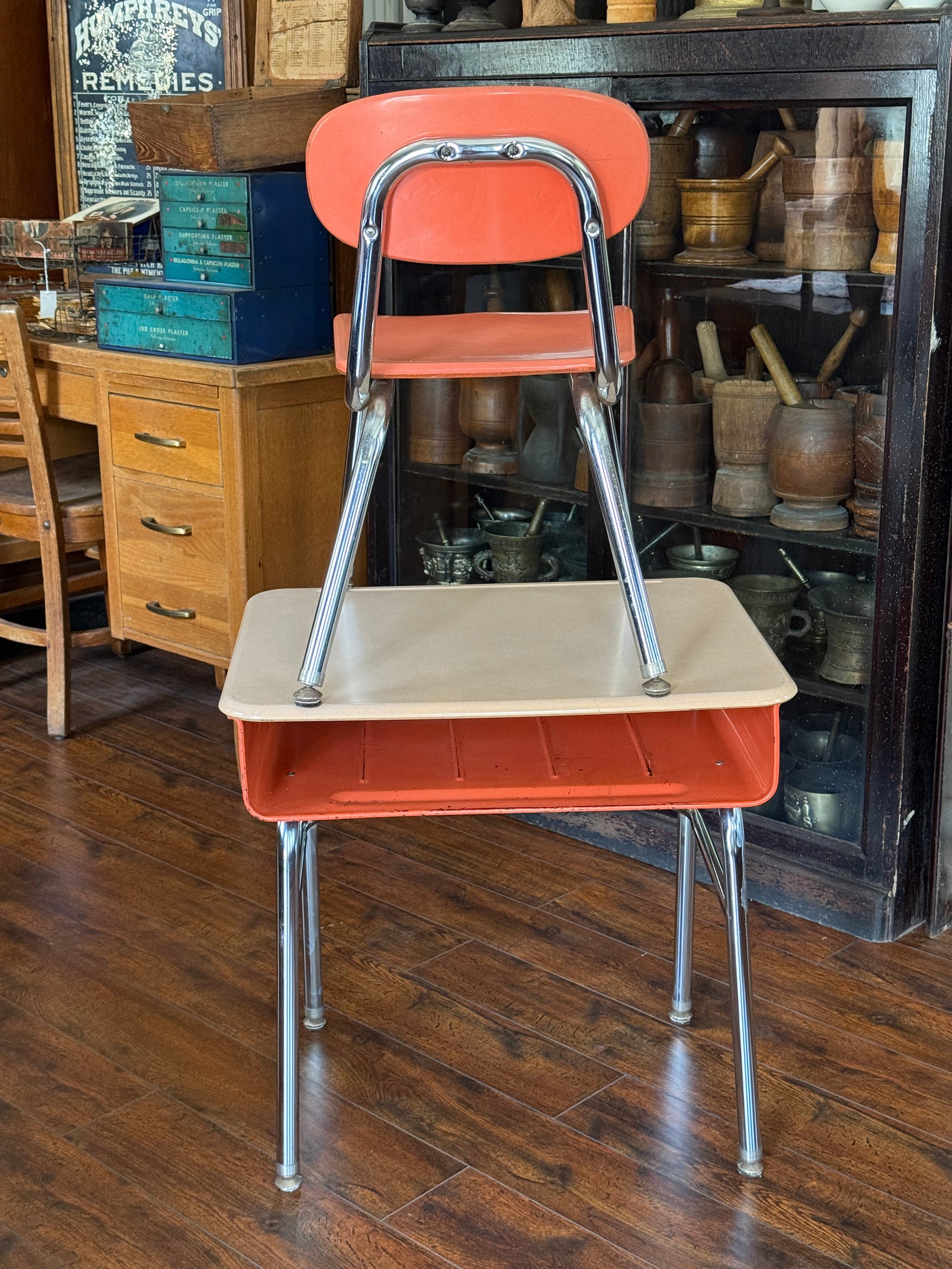 Mid-century salmon, vintage metal school desk, and chair