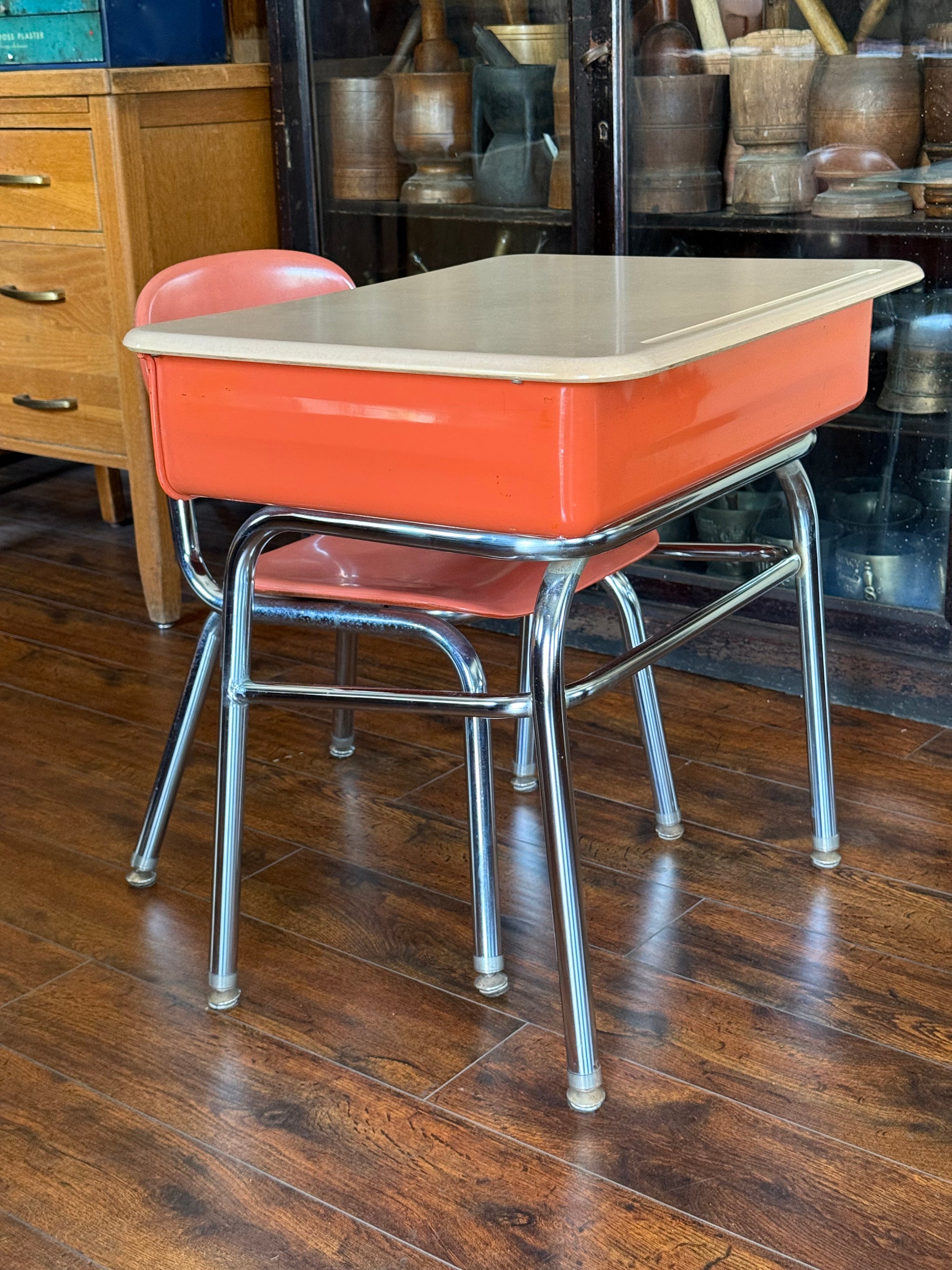 Mid-century salmon, vintage metal school desk, and chair